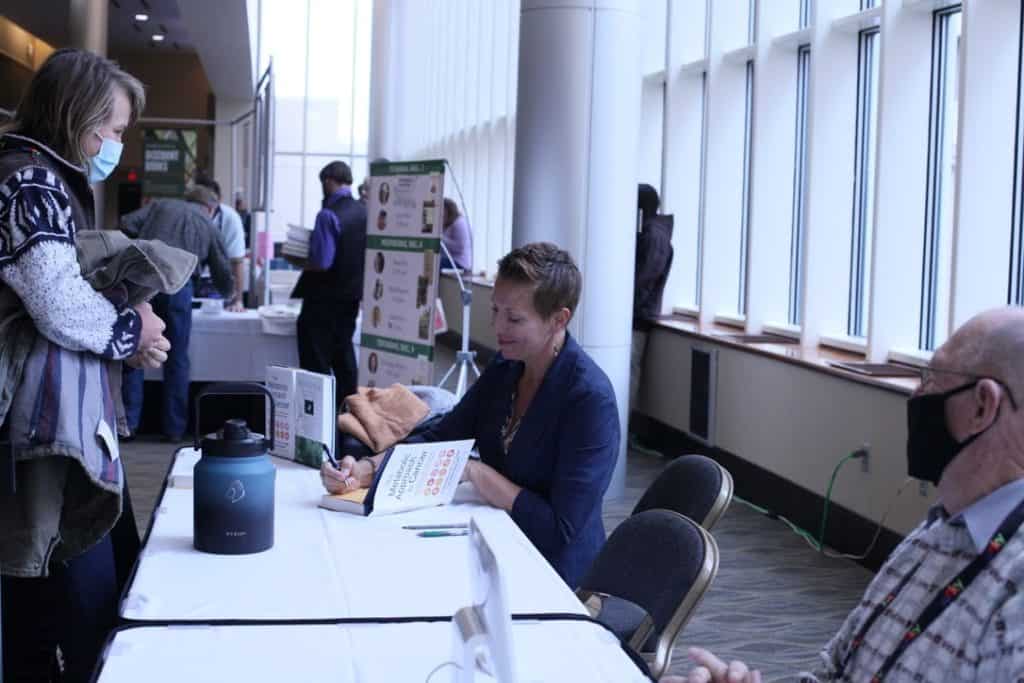 Dr. Nasha Winters signing books